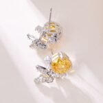 Butterfly CZ rose cut stud earrings featuring a paved openwork butterfly motif set atop a large rose-cut main gem with 925 sterling silver posts