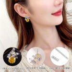Butterfly CZ rose cut stud earrings featuring a paved openwork butterfly motif set atop a large rose-cut main gem with 925 sterling silver posts
