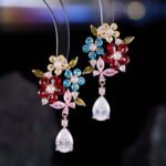 Floral gem CZ bouquet drop earrings featuring a cluster of colorful marquise flower petals, marquise leaves, a dangling teardrop gem, and 925 sterling silver ear posts