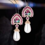 Royal teardrop pearl drop earrings wholesale featuring colorful CZ halo crests, pavé caps, and large teardrop pearls with 925 sterling silver posts from junejewelry.com