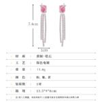 Long tassel CZ drop earrings featuring a cushion-cut colored crystal stud with marquee crystal butterfly accents and cascading cubic zirconia fringe strands on palladium-plated brass with 925 sterling silver posts.