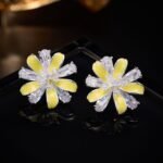 Layered bloom stud earrings featuring alternating glossy enamel petals and marquise-cut clear CZ crystals, available in yellow, sky blue, and pastel rainbow options.
