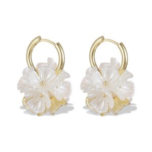 Mother of pearl flower hoop earrings with natural carved shell petals, AAA cubic zirconia accents, and gold-plated huggie hoop closure.
