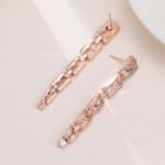 Geometric chain link CZ linear drop earrings in rose gold featuring micro-paved interlocking rectangular links and 925 sterling silver ear posts
