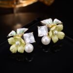 Enamel flower pearl CZ stud earrings featuring pastel resin petals, freshwater pearl accents, square crystal stone, and 925 sterling silver posts.