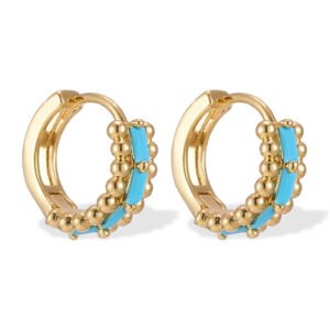 Small beaded huggie hoop earrings set with baguette-cut turquoise stones and flanked by textured metal beads in gold and silver plating options.