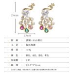Peacock CZ crystal stud earrings featuring pear-cut body stone and colorful teardrop feather CZ accents with 925 sterling silver posts.