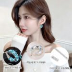 Half-hoop earrings channel-set with square emerald-cut AAA cubic zirconia stones, available in clear silver, aqua blue, and peridot green options.