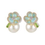 Enamel flower pearl stud earrings featuring micro-paved CZ petal borders, center round stone, glossy pearl drop, and 925 sterling silver ear posts