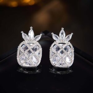 Sparkling pineapple stud earrings featuring marquise-cut crystal crown leaves, lattice fruit body, and micro-pavé accents in yellow, pink, and clear options.