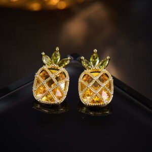 Sparkling pineapple stud earrings featuring marquise-cut crystal crown leaves, lattice fruit body, and micro-pavé accents in yellow, pink, and clear options.