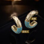 Chunky quilted diamond-pattern C-shaped half hoop earrings with a micro-set turquoise bead trim on the bottom edge, available in gold and silver metal finishes.