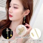 Butterfly CZ long dangle earrings featuring a micro-paved crystal butterfly top, asymmetric teardrop gemstone drops, and 925 sterling silver ear posts.