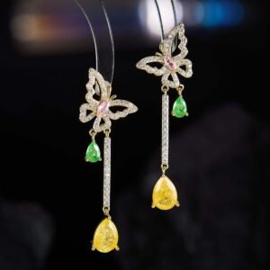 Butterfly CZ long dangle earrings featuring a micro-paved crystal butterfly top, asymmetric teardrop gemstone drops, and 925 sterling silver ear posts.