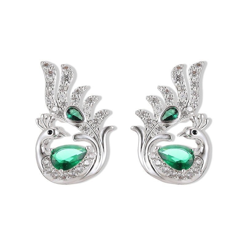 Sculpted peacock-shaped stud earrings set with vibrant pear-cut cubic zirconia stones and pavé feather details, available in emerald green, rose pink, and sapphire blue options.