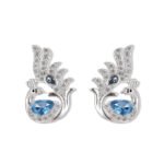 Sculpted peacock-shaped stud earrings set with vibrant pear-cut cubic zirconia stones and pavé feather details, available in emerald green, rose pink, and sapphire blue options.
