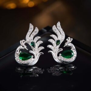 Sculpted peacock-shaped stud earrings set with vibrant pear-cut cubic zirconia stones and pavé feather details, available in emerald green, rose pink, and sapphire blue options.