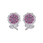 Sparkling CZ sunflower stud earrings wholesale featuring pave-set cubic zirconia flower petals, leafed stems, and 925 sterling silver posts available on junejewelry.com
