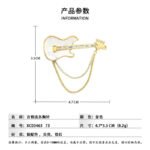 Cool rock style natural mother of pearl guitar brooch pin wholesale featuring 18K real gold plated copper, baguette CZ neck, and draped chain tassels from junejewelry.com