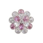 Pink crystal flower brooch wholesale featuring two layers of faceted teardrop cubic zirconia petals in clear and soft pink tones with a textured silver-plated finish from junejewelry.com