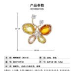 Crystal butterfly brooch wholesale featuring faceted glass crystal wings, cubic zirconia center body, and round CZ antenna tips from junejewelry.com