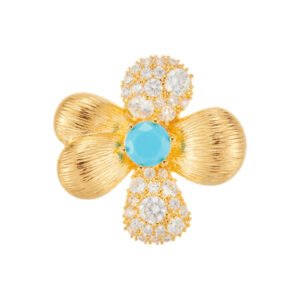 Four petal flower brooch wholesale featuring two brushed gold finish petals, two pavé cubic zirconia petals, and a turquoise stone center in gold plating from junejewelry.com