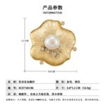 Vintage brushed gold pearl flower brooch wholesale featuring a textured wire-brushed gold flower petal design, central white pearl, and embedded cubic zirconia accents from junejewelry.com