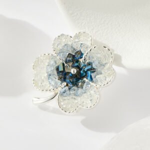 Elegant magnetic four leaf clover crystal brooch wholesale featuring four clover petals filled with crushed ice crystals and bi-color center accents, with a pinless magnetic back clasp from junejewelry.com