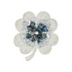 Elegant magnetic four leaf clover crystal brooch wholesale featuring four clover petals filled with crushed ice crystals and bi-color center accents, with a pinless magnetic back clasp from junejewelry.com