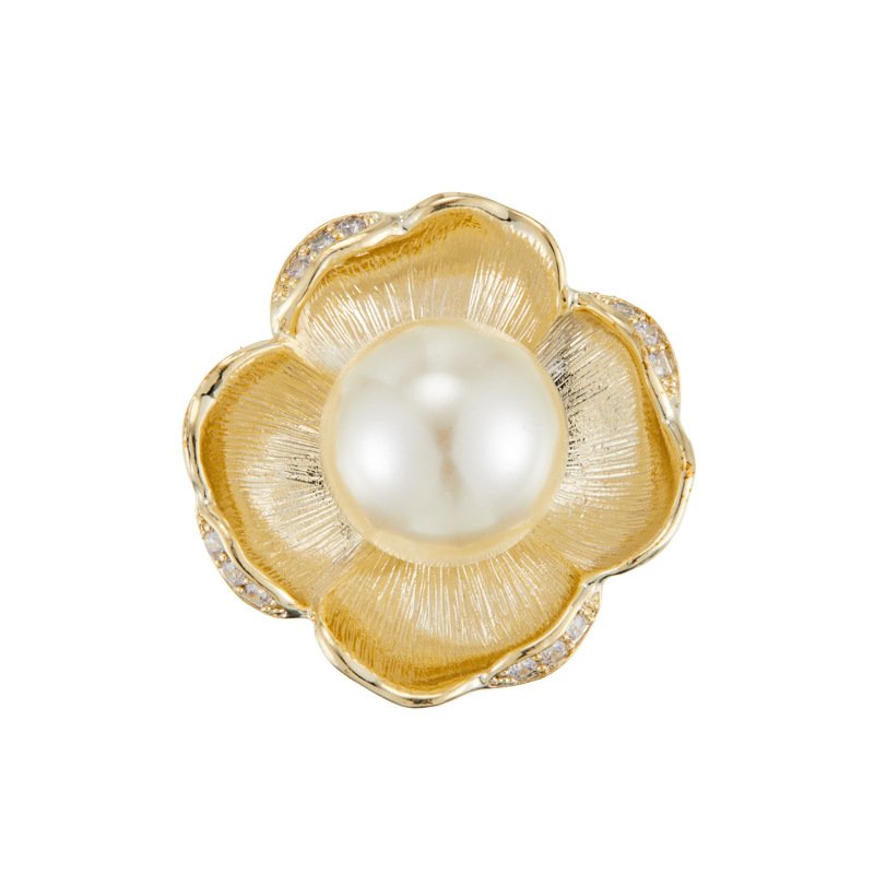 Pearl flower brooch wholesale featuring five brushed gold textured petals trimmed with micro-pavé cubic zirconia and a large center faux pearl from junejewelry.com