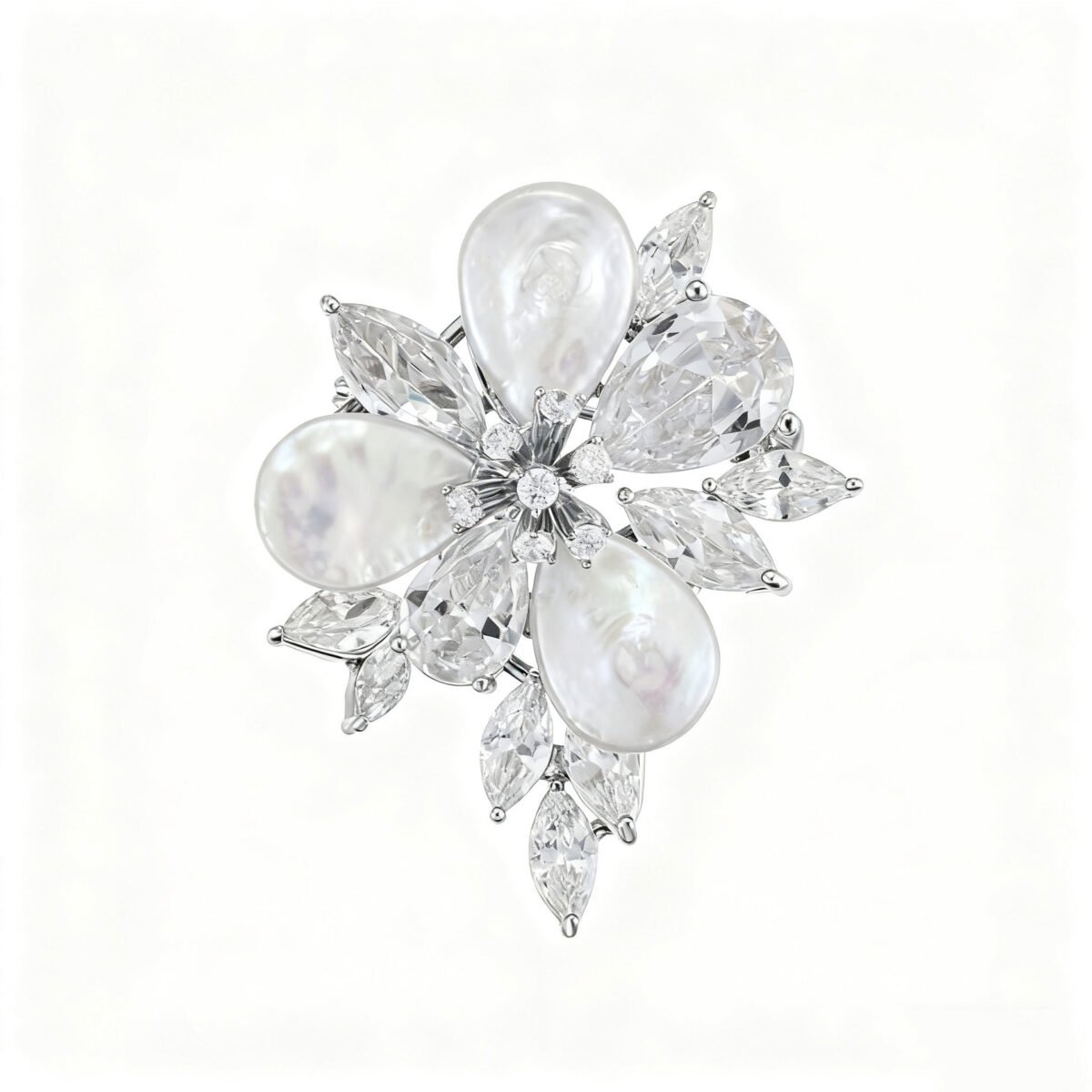 High-end baroque pearl flower CZ brooch wholesale featuring iridescent teardrop baroque shell petals, brilliant pear and marquise cubic zirconia stones, and detailed central stamens from junejewelry.com