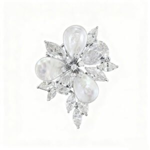 High-end baroque pearl flower CZ brooch wholesale featuring iridescent teardrop baroque shell petals, brilliant pear and marquise cubic zirconia stones, and detailed central stamens from junejewelry.com