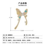 Pearl turquoise butterfly brooch wholesale featuring micro-pavé cubic zirconia wings studded with round pearls and round turquoise cabochons from junejewelry.com