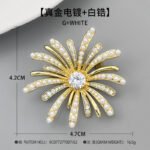 Dazzling firework pearl crystal brooch wholesale featuring radiating metallic rays set with round pearls and pave cubic zirconia centered around a brilliant jewel gemstone, with convertible pendant hook functionality from junejewelry.com