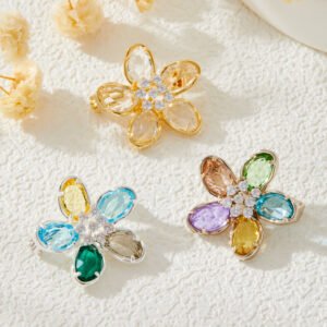 Colorful five-petal flower brooch pin wholesale featuring oval-cut cubic zirconia crystal petals with a micro-pave CZ centerpiece from junejewelry.com
