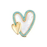 Double heart mother of pearl brooch wholesale featuring a carved shell primary heart with a turquoise or clear CZ halo border alongside a metallic accent heart from junejewelry.com
