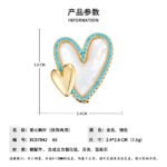 Double heart mother of pearl brooch wholesale featuring a carved shell primary heart with a turquoise or clear CZ halo border alongside a metallic accent heart from junejewelry.com
