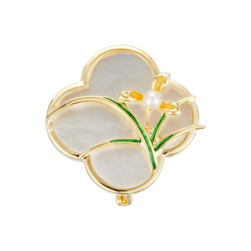 XC07901 (3) Vintage style four leaf clover mother of pearl orchid brooch wholesale featuring a natural white mother of pearl clover base overlaid with green enamel orchid leaves and a freshwater pearl flower center in gold or silver finish from junejewelry.com