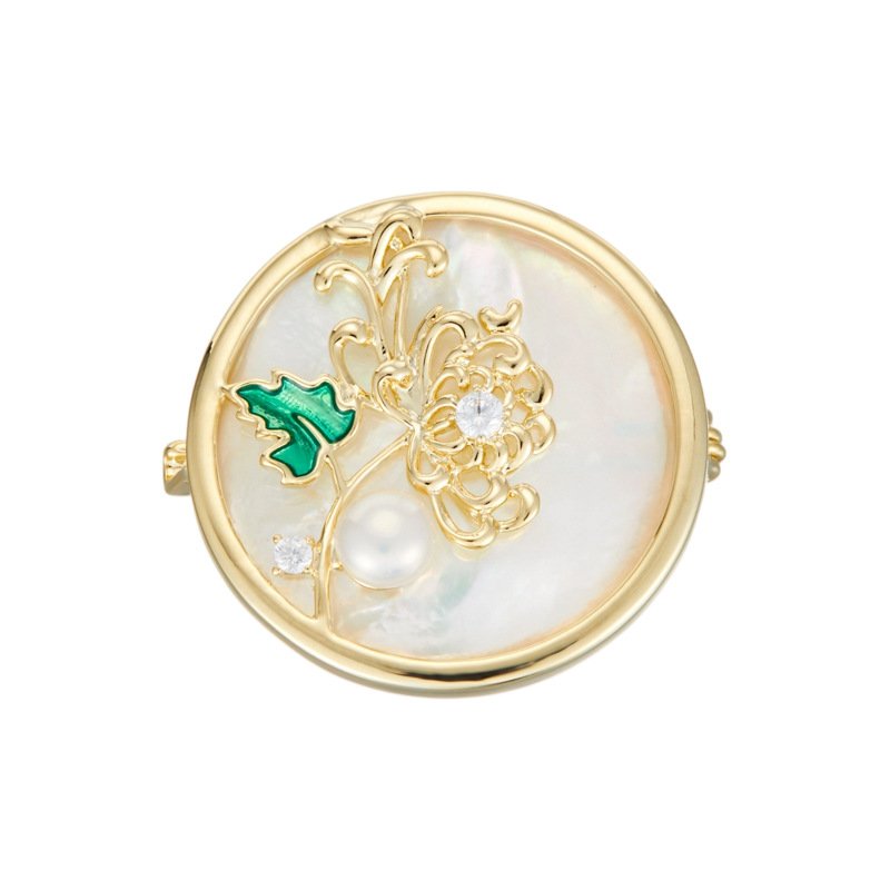 XC07905 (6) Chinese style enamel chrysanthemum pearl brooch wholesale featuring a circular natural mother of pearl disc, delicate wirework chrysanthemum with green enamel leaf, cubic zirconia sparkles, and a freshwater pearl from junejewelry.com