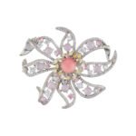 Light luxury pink floral queen conch shell brooch wholesale featuring a pink queen conch shell central cabochon surrounded by yellow, pink, clear cubic zirconia stones, soft purple bead accents, and silver pave openwork petals from junejewelry.com
