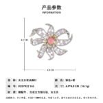 Light luxury pink floral queen conch shell brooch wholesale featuring a pink queen conch shell central cabochon surrounded by yellow, pink, clear cubic zirconia stones, soft purple bead accents, and silver pave openwork petals from junejewelry.com