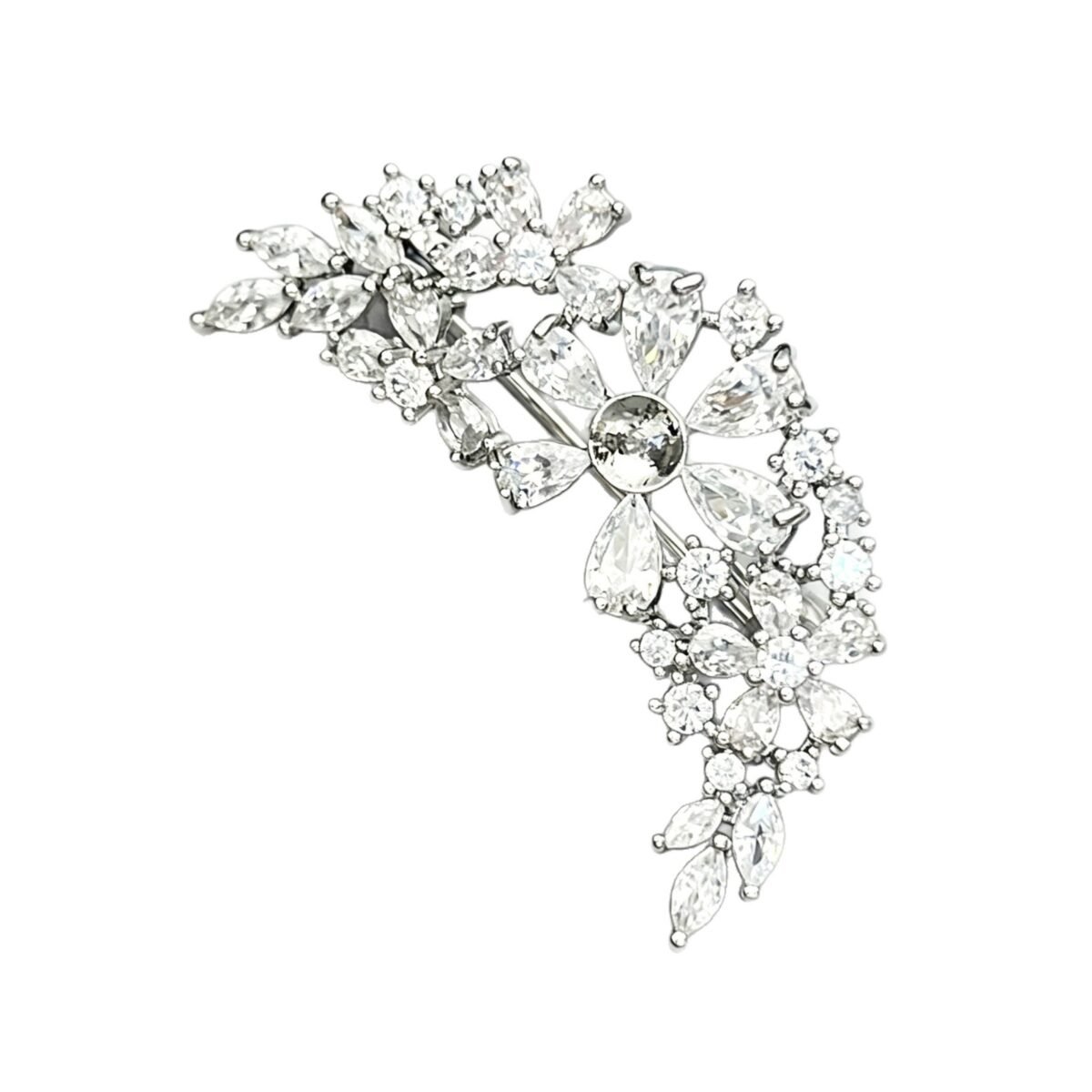 Sparkly silver curved floral CZ cluster brooch wholesale featuring brilliant pear-cut, marquise-cut, and round cubic zirconia stones in an arching vine design from junejewelry.com
