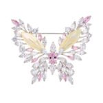 Elegant butterfly shell crystal brooch wholesale featuring carved natural shell inner wings framed by marquise cubic zirconia crystal clusters and a convertible dual-hook back pin from junejewelry.com