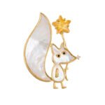Cute fox star brooch wholesale featuring mother of pearl shell body and tail inlay, holding a yellow crystal star wand with cubic zirconia nose detail from junejewelry.com