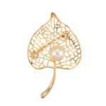 Pearl leaf brooch wholesale featuring a filigree hollow leaf pattern frame with a center glass pearl in gold and silver plating from junejewelry.com