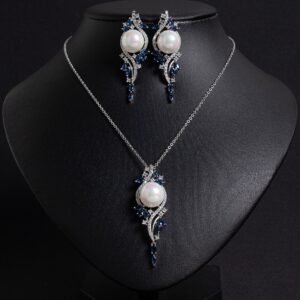 Niche pearl crystal vine jewelry set wholesale featuring a lustrous synthetic pearl encircled by an asymmetric marquise crystal vine motif with matching drop earrings from junejewelry.com