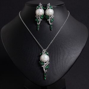 Niche pearl crystal vine jewelry set wholesale featuring a lustrous synthetic pearl encircled by an asymmetric marquise crystal vine motif with matching drop earrings from junejewelry.com