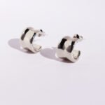 Wholesale modern curved concave huggie hoop earrings with genuine 18K gold and white gold plating on copper