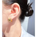 Wholesale modern curved concave huggie hoop earrings with genuine 18K gold and white gold plating on copper