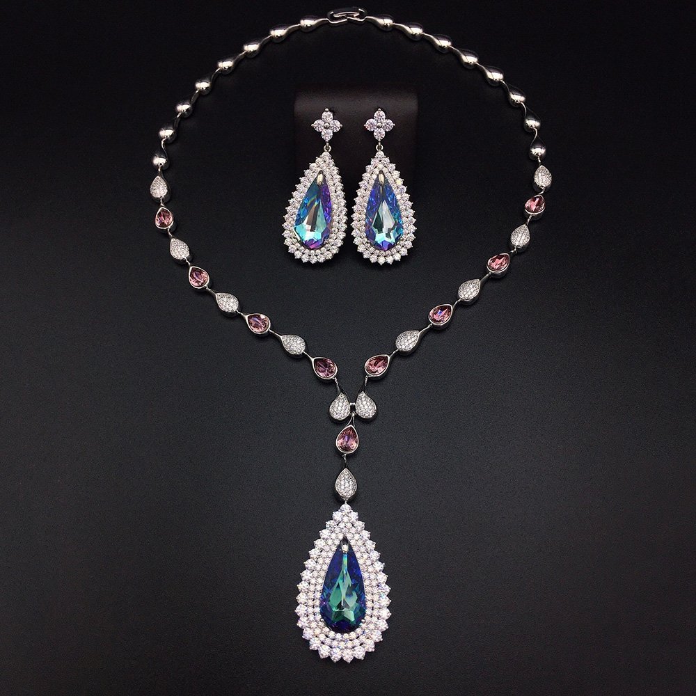 1302857-G100131E17Y.1074.A Silver statement necklace and drop earrings jewelry set with teardrop Swarovski Element crystals and pave halo wholesale